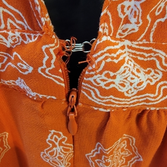 Loft medium orange top. Zipper back with shoulder straps with little pom poms. - Picture 9 of 15
